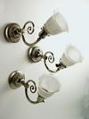 Appraisal: WALL LIGHTS - Three Art Deco wall mount light fixtures