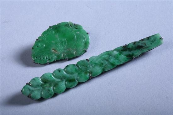 Appraisal: TWO CHINESE APPLE GREEN JADE BROOCHES One of leaf-form the