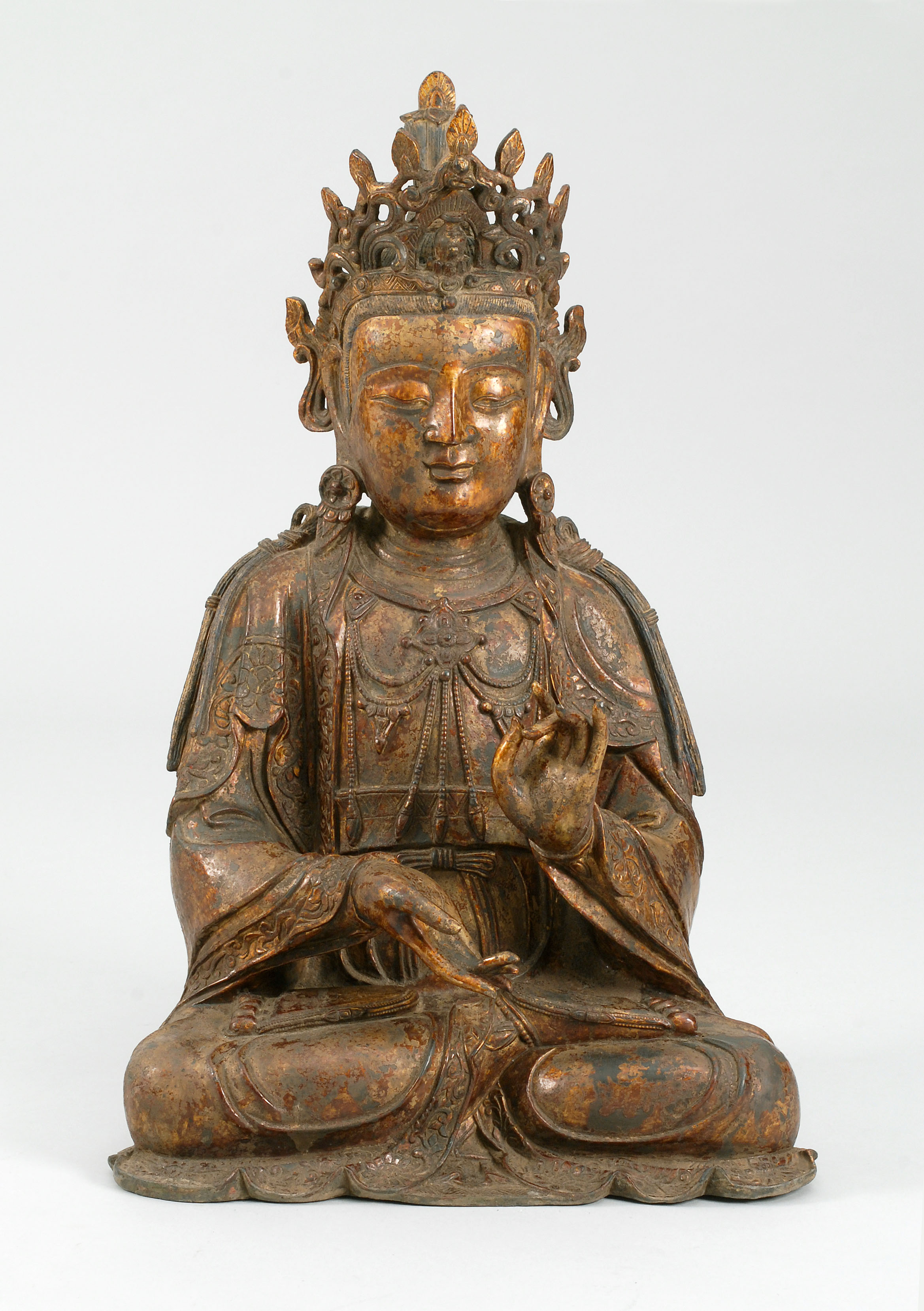 Appraisal: GILT-BRONZE FIGURE OF BUDDHA Ming StyleSeated in lotus posture while