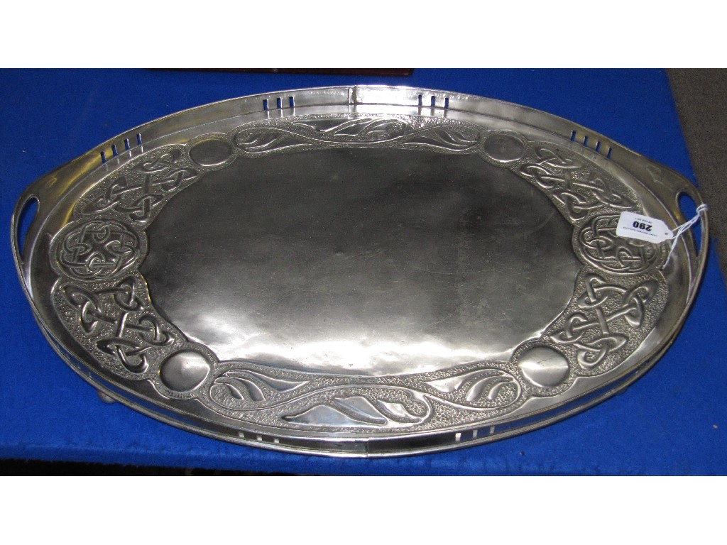 Appraisal: White metal double handled tray with Celtic knot decoration