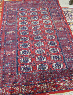 Appraisal: SIGNED BOKHARA AREA RUG centering a field of geometric Turkoman