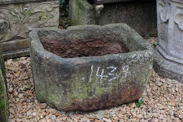 Appraisal: AN OLD ENGLISH LIMESTONE TROUGH of rough cut rectangular form