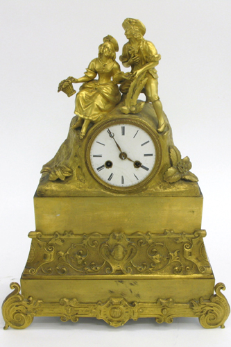 Appraisal: FRENCH GILT METAL CASED MANTEL CLOCK with gilt bronze figures