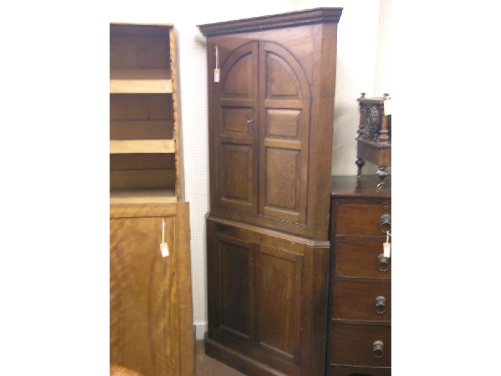 Appraisal: A mid th century oak floor-standing corner cupboard upper stage