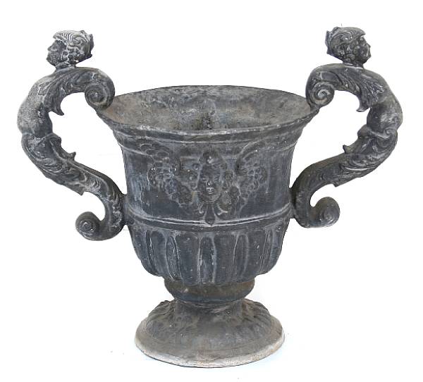 Appraisal: A pair of George III style lead garden urns height