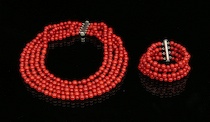 Appraisal: A Multi-Strand Beaded Coral Necklace Bracelet A five strand necklace