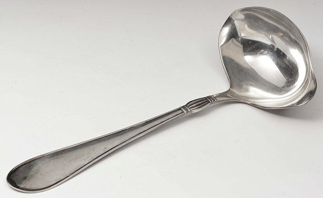 Appraisal: A DANISH SILVER SOUP LADLE with painted hand and central