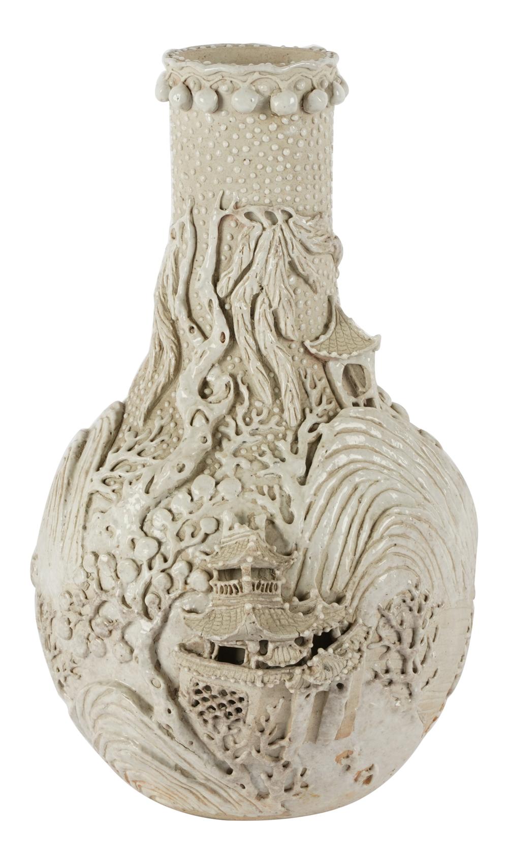 Appraisal: ASIAN WHITE GLAZED CERAMIC VASEmolded four-character mark to underside decoration