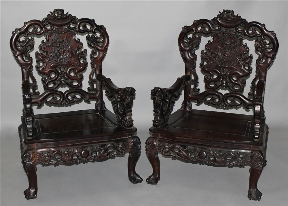 Appraisal: PAIR OF JAPANESE HARDWOOD ARM CHAIRS LATE MEIJI PERIOD TH