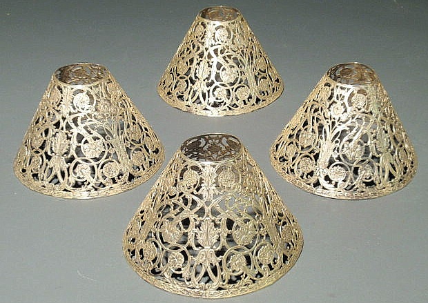 Appraisal: Four Gorham pierced sterling silver shades with ornate floral motif