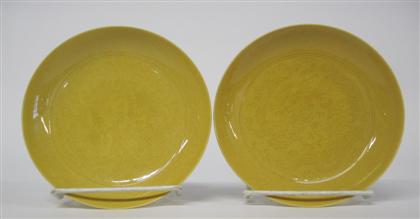 Appraisal: Pair of Chinese yellow ground porcelain saucer dishesdaoguang marks th