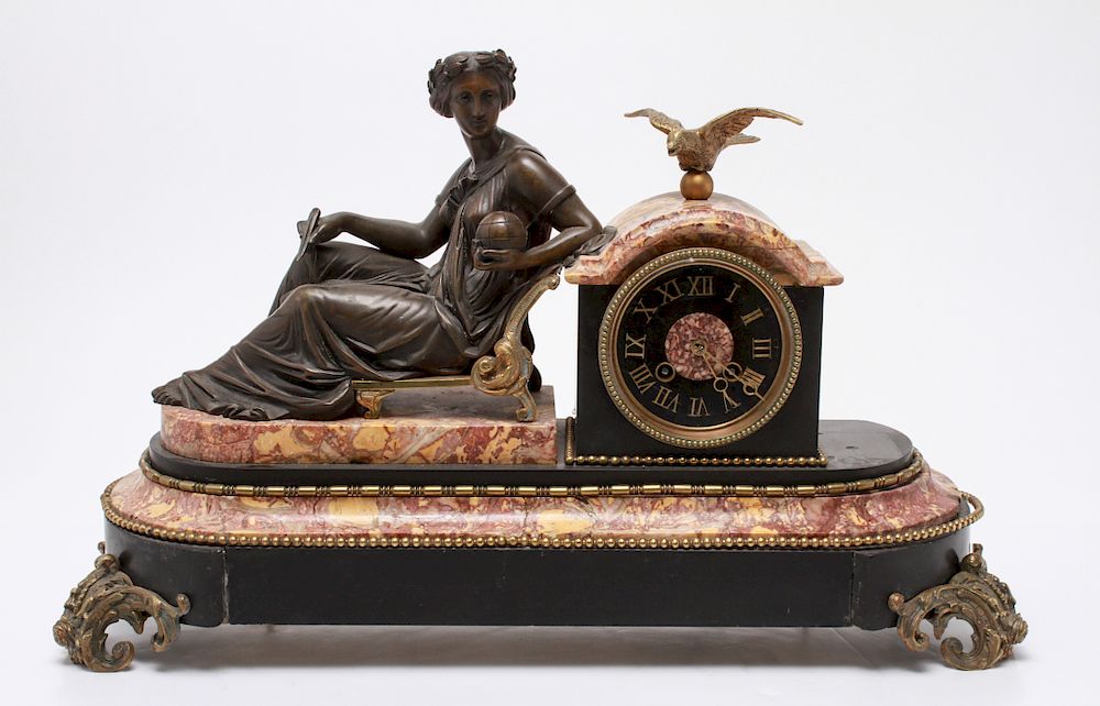 Appraisal: Neoclassical Bronze Figurative Mantel Clock Neoclassical bronze figurative mantel clock