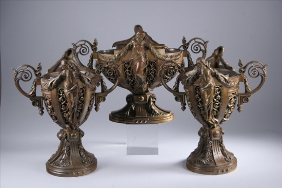 Appraisal: THREE-PIECE ART NOUVEAU BRONZE GARNITURE late th-early th century Each