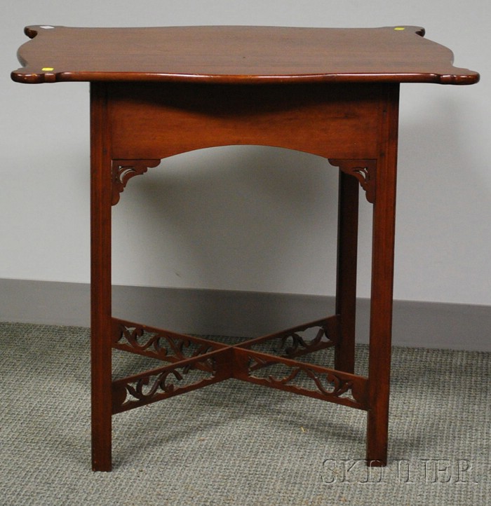 Appraisal: Chippendale-style Carved Mahogany Tea Table with Crossed Stretcher Base ht