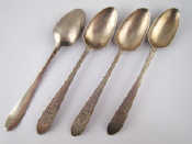 Appraisal: Irish silver A set of four Celtic point brightcut dessertspoons