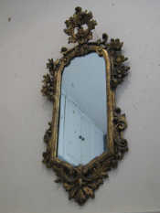 Appraisal: A well carved giltwood wall mirror x cm