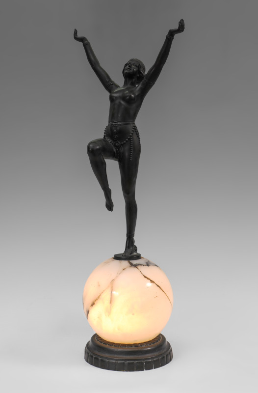 Appraisal: ART DECO SEMI NUDE DANCER LAMP Patinated metal figure of