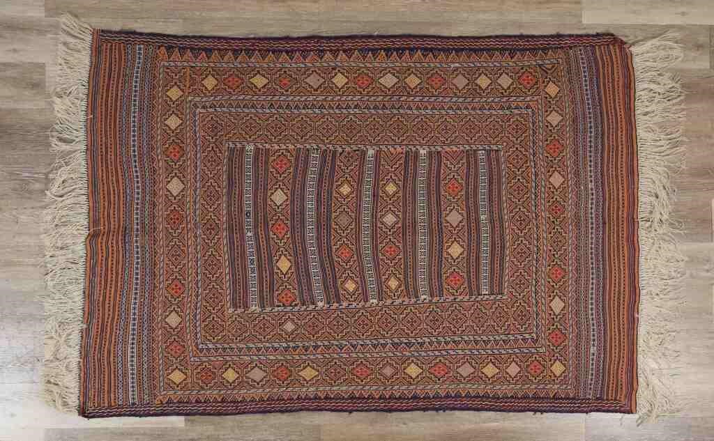 Appraisal: BOKHARA STYLE RUGSmall stain to one section of rug Two