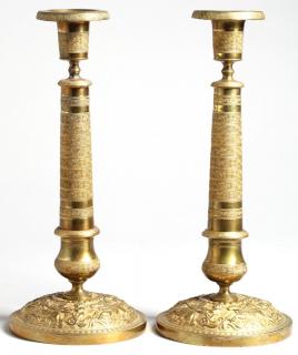 Appraisal: Pair of Neoclassical Copiously adorned with cherubs in chariots anthemion