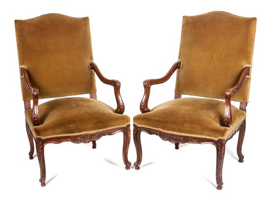 Appraisal: Sale Lot A Pair of Victorian Carved Walnut Open Armchairs