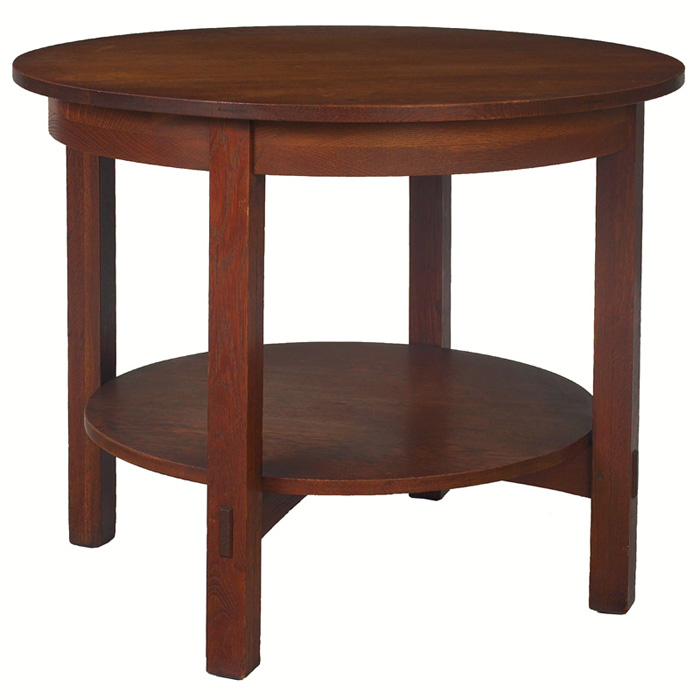 Appraisal: L JG Stickley lamp table circular top over a lower