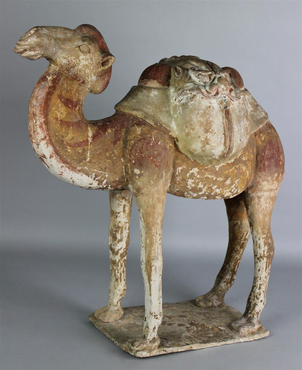 Appraisal: CHINESE MASSIVE POLYCHROME EARTHENWARE PACK CAMEL TANG DYNASTY the tall