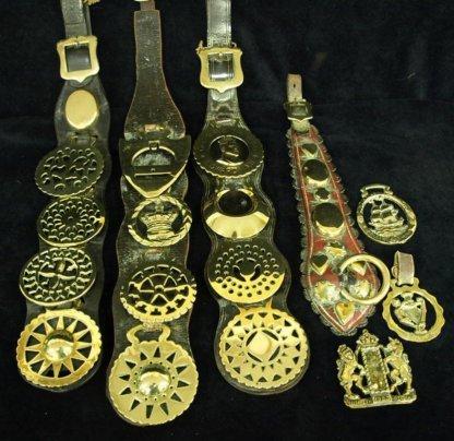 Appraisal: Three leather straps each set four horse brasses another mounted