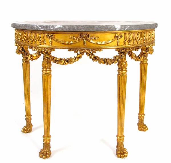 Appraisal: A Neoclassical style giltwood console table with marble top height