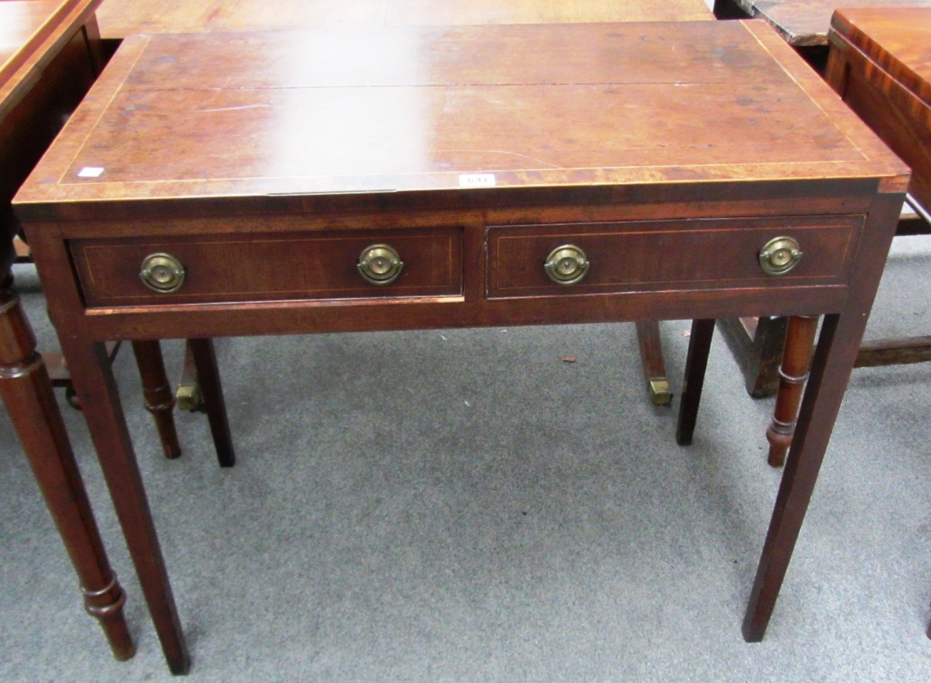 Appraisal: A George III inlaid mahogany rectangular side table with two