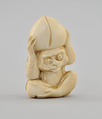 Appraisal: Sitting Monkey with Coconut on Its Head Ivory Netsuke The