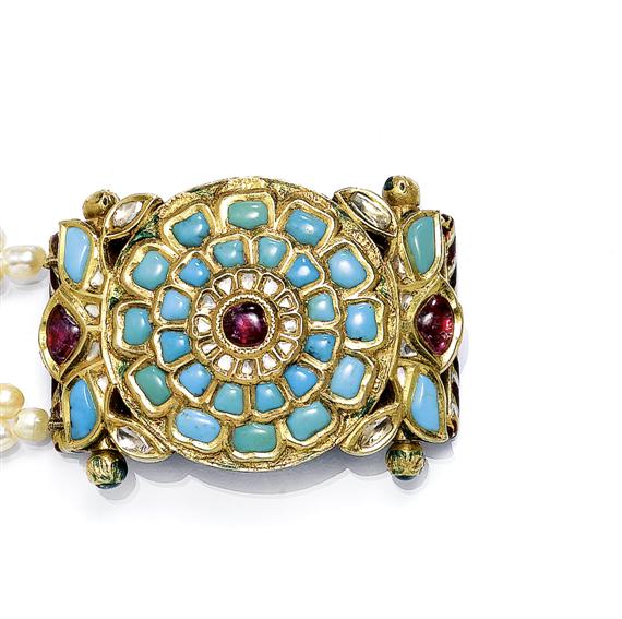 Appraisal: A TURQUOISE RUBY DIAMOND AND ENAMEL PENDANT ON A PERAL