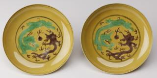 Appraisal: Chinese dragon saucers Qianlong mark w Pair of Chinese drinking