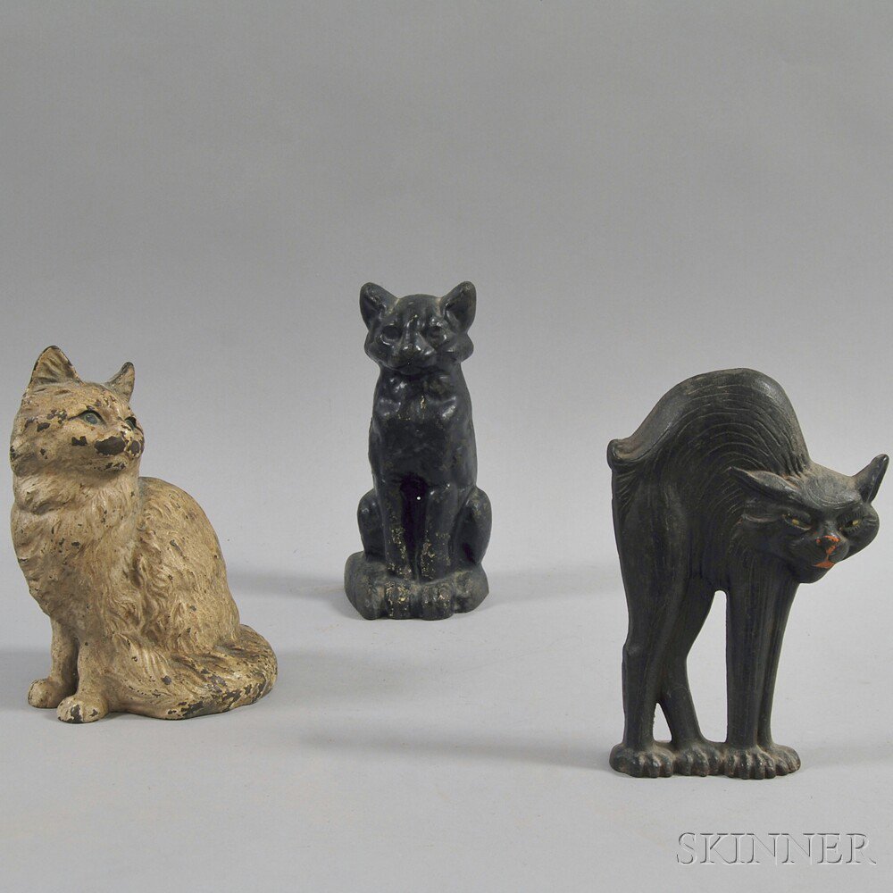 Appraisal: Three Painted Cast Iron Cat Doorstops two seated and one