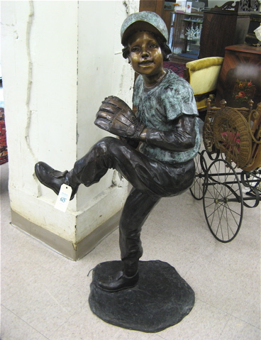 Appraisal: FIGURAL BRONZE FLOOR SCULPTURE young boy baseball pitcher of the