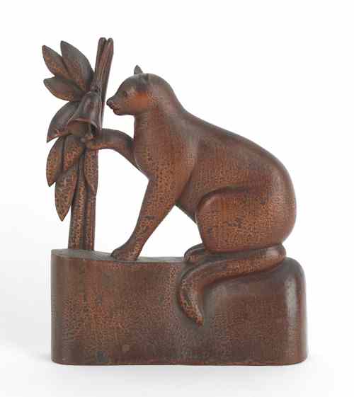 Appraisal: Carved pine figure of a cat ringing a bell th