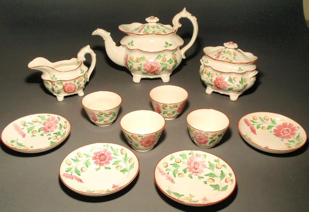 Appraisal: English Davenport tea set- pot h sugar bowl h creamer