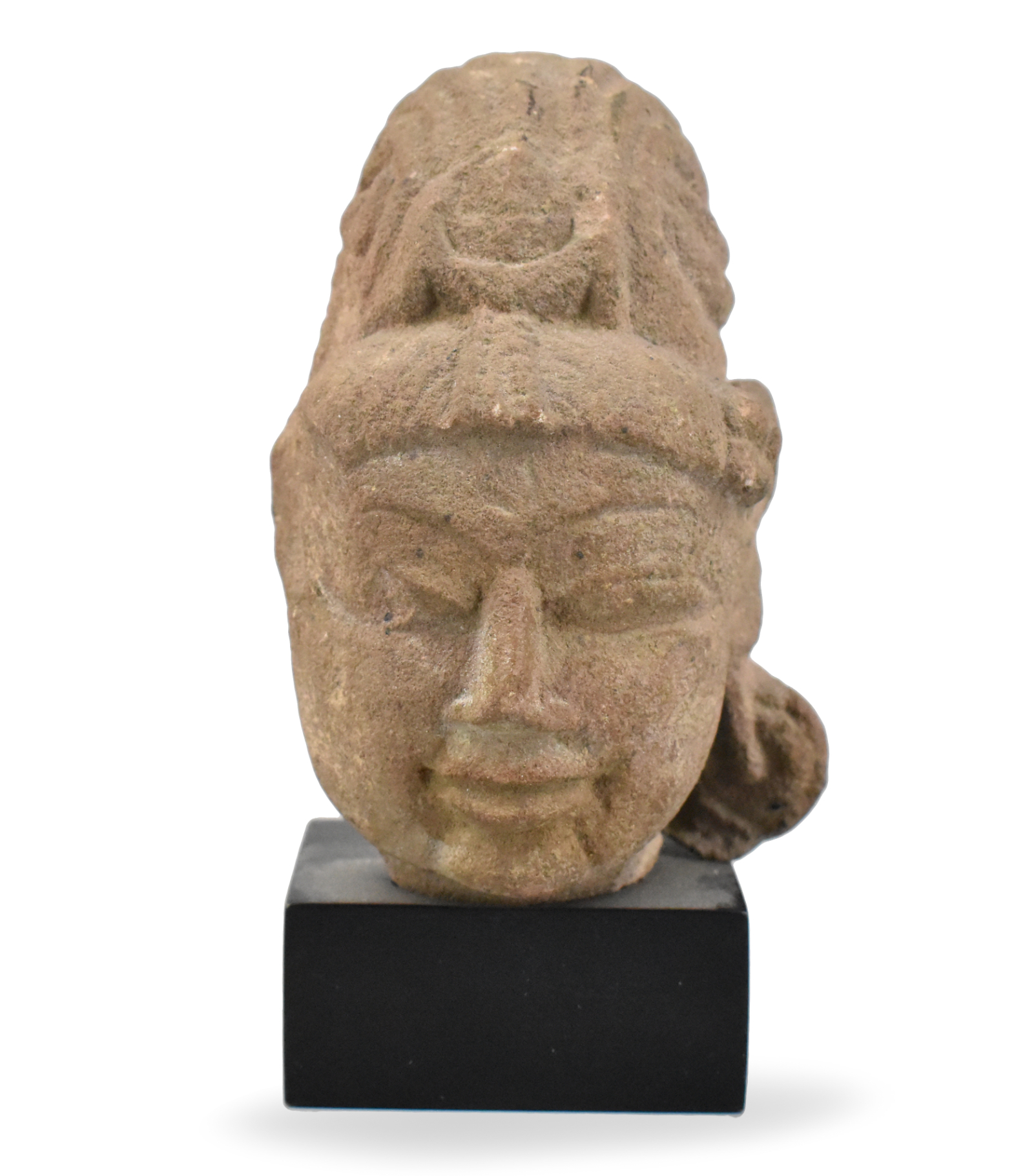 Appraisal: An Indian Gandhara stone carved head on a wooden stand