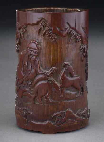 Appraisal: Chinese Qing carved bamboo brush potdepicting a scholar with two