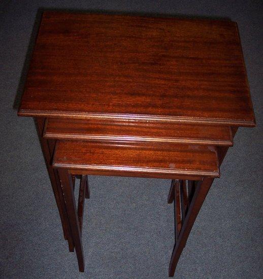 Appraisal: A nest of three mahogany tables rectangular tops with taper