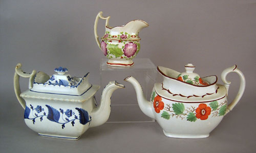 Appraisal: Two pearlware teapots th c with floral decoration h and