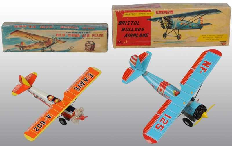 Appraisal: Lot of Tin Litho Airplane Toys Description Japanese Working Includes