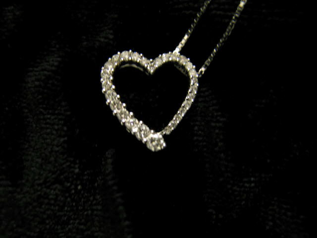 Appraisal: Diamond Heart Pendant diamonds totaling carat in k white gold