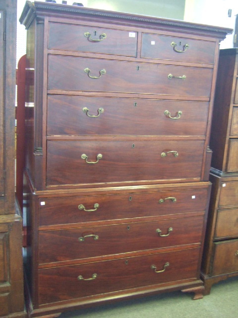 Appraisal: A George III mahogany chest on chest the dentil cornice