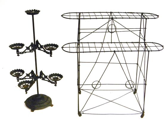 Appraisal: Two plant stands the first late th C cast iron