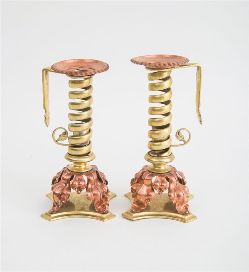 Appraisal: PAIR OF ENGLISH ARTS AND CRAFTS COPPER AND BRASS CANDLESTICKS