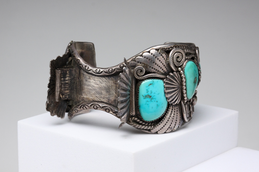 Appraisal: Mid- th century Elaborate silver work cuff set with four