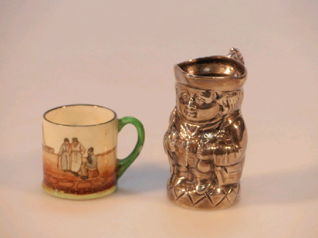 Appraisal: A Royal Doulton series ware miniature mug polychrome printed and