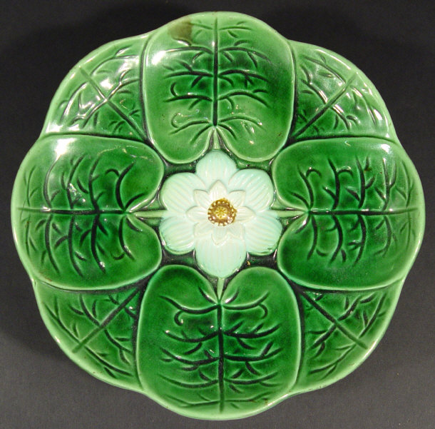 Appraisal: Three footed Majolica tazza relief moulded with leaves and a