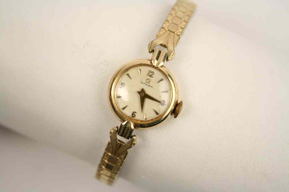 Appraisal: WRIST WATCH - Lady's K Omega round head wristwatch gold