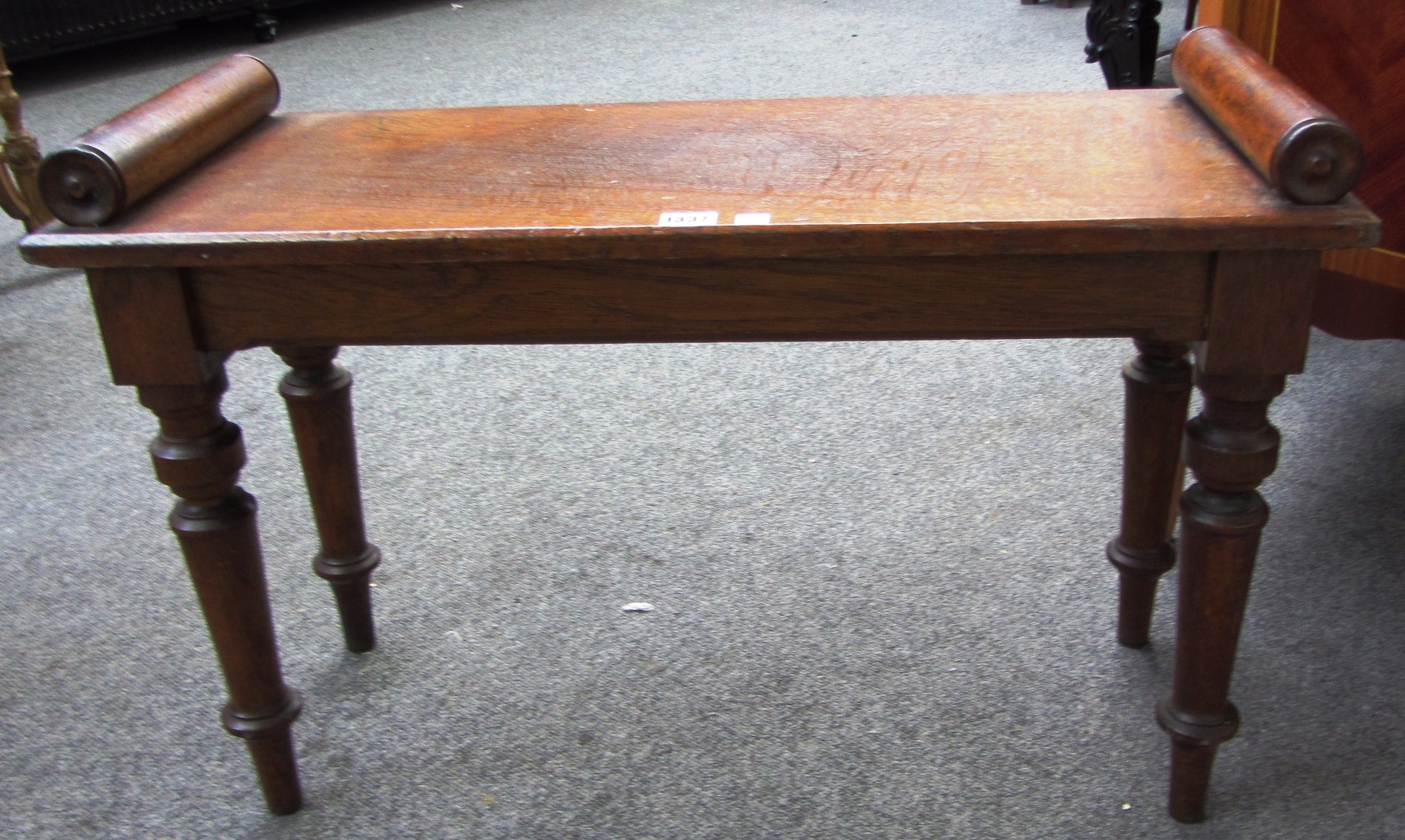 Appraisal: A small th century oak window seat with turned end